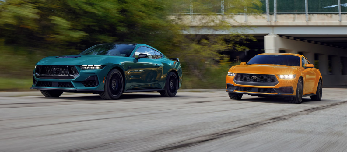 A pair of 2026 Ford Mustangs on the road