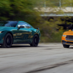 A pair of 2026 Ford Mustangs on the road