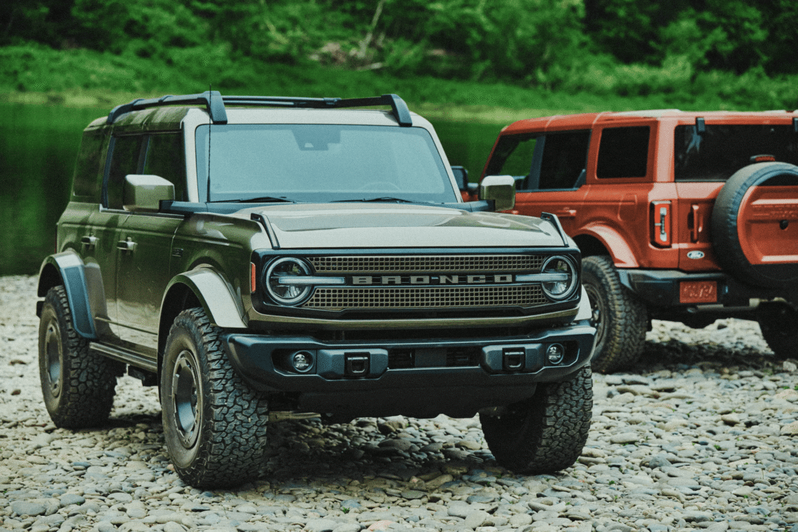 Ford Bronco Filson parked near a lake