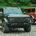 Ford Bronco Filson parked near a lake