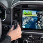 Driver using Ford driver assistance features